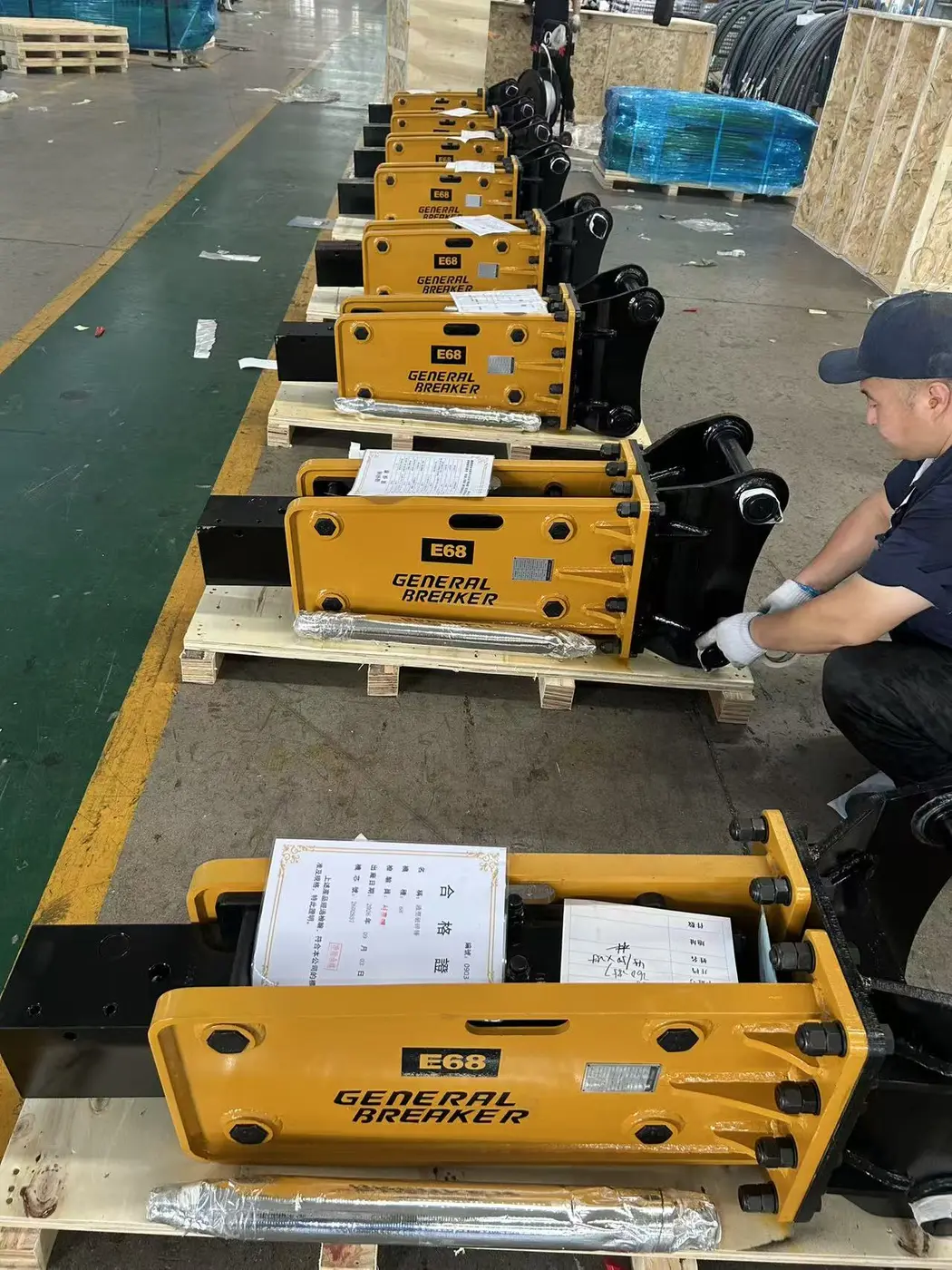 Eight upgraded E68 SB40-class hydraulic breakers prepared for the Mexico customer repeat order