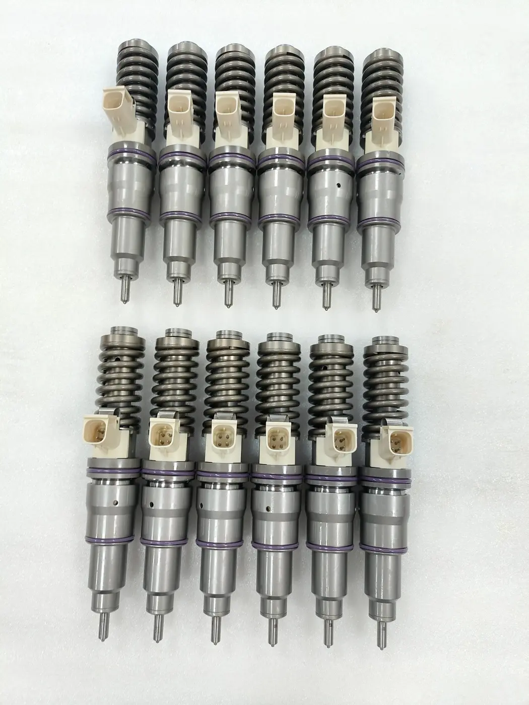 Twelve fuel injectors prepared for a customer order